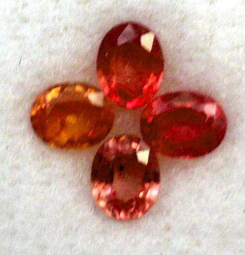 1..420CT OF SONGEA ORANGE SAPPHIRES:  SET OF 4 .