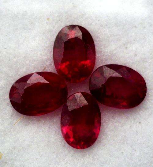 STUNNING SET OF 4 CRIMSON RED MADAGASCAN RUBIES  ..  4.690CTS