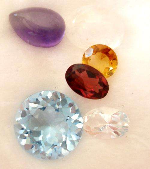 GEM PACK - CONTAINING CITRINE, MOONSTONE, AMETHYST, BLUE TOPAZ ETC WEIGHT 7.06CT