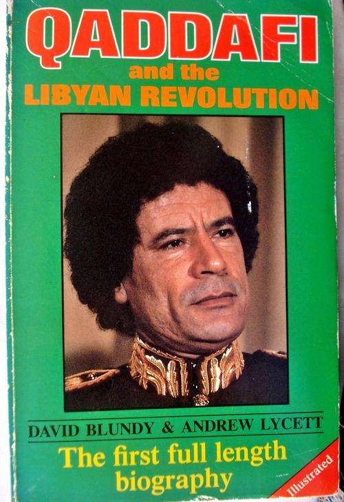 QADDAFI AND THE LIBYAN REVOLUTION - DAVID BLUNDY AND ANDREW LYCETT.