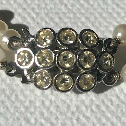 Vintage double strand faux pearl necklace with rhinestone clasp signed Metall