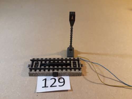 Marklin M track uncoupling rail with light