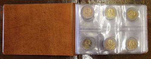 48 Mandela 90th birthday uncirculated R5 in Lidner book.