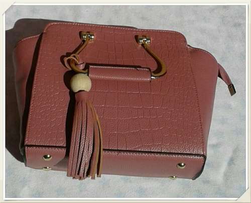 A portable  nice women handbag for women month