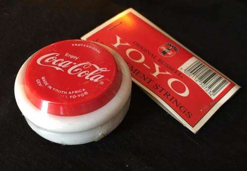 Coca Cola Yo-Yo Genuine Russell still wrapped. With set of spare strings.