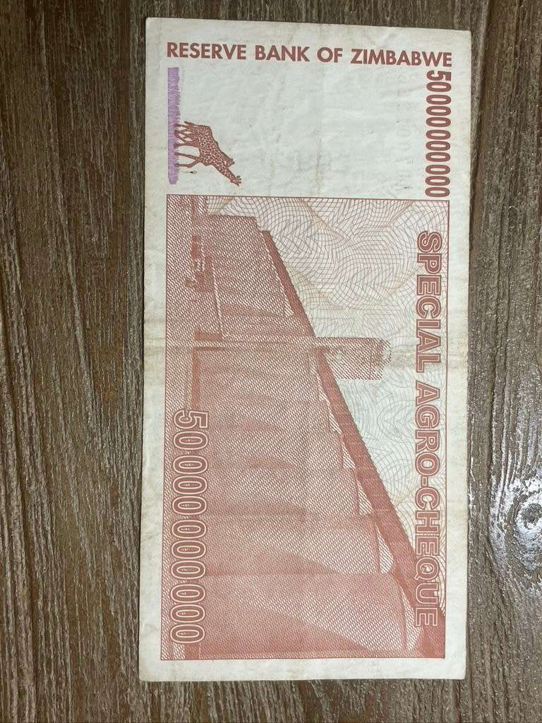 Zimbabwe***50 million*** 2008 Bearer Cheque - Very collectable and crisp but marked on top