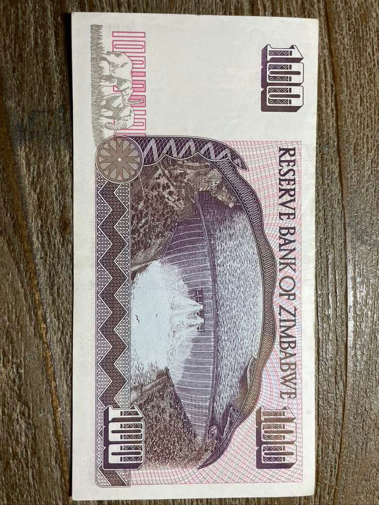 Zimbabwe  *  $100  *    *  au condition