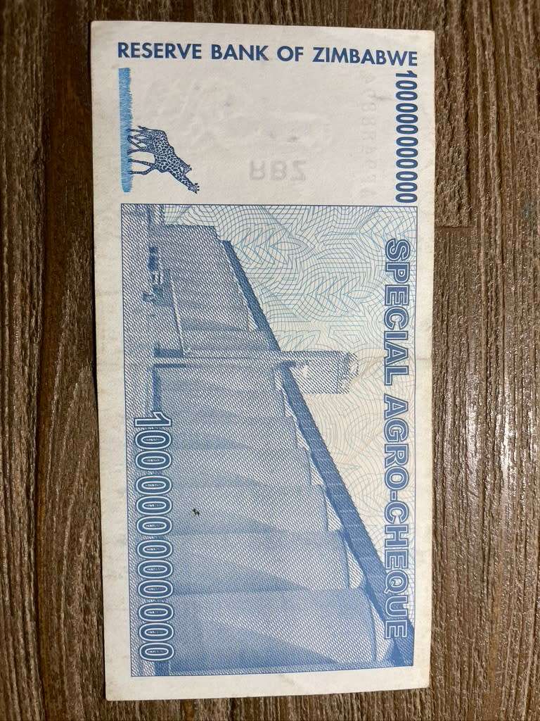 Zimbabwe  *  10 billion  *  2008 bearer cheque  *  please refer to picture for grade