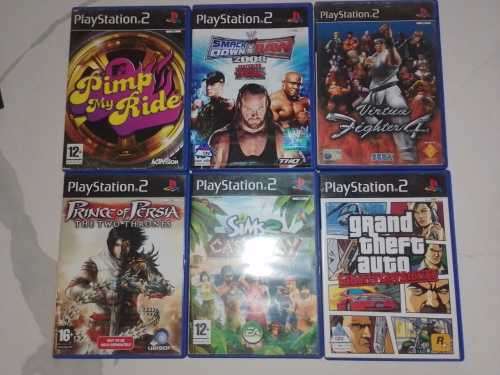 Playstation 2 with 18 games, 2 remotes and 3 memory cards