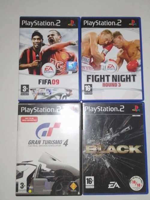 Playstation 2 with 18 games, 2 remotes and 3 memory cards