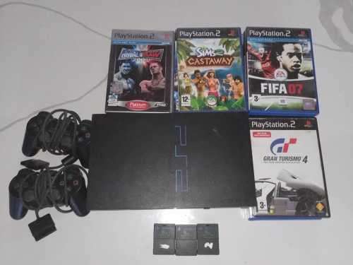 Playstation 2 with 18 games, 2 remotes and 3 memory cards