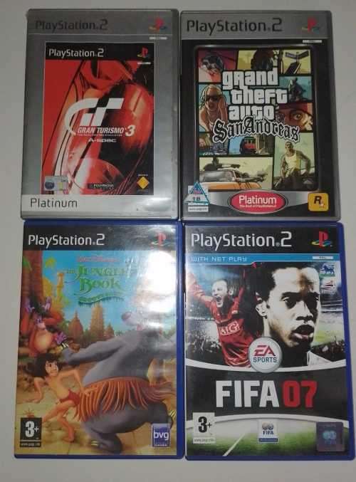 Playstation 2 with 18 games, 2 remotes and 3 memory cards