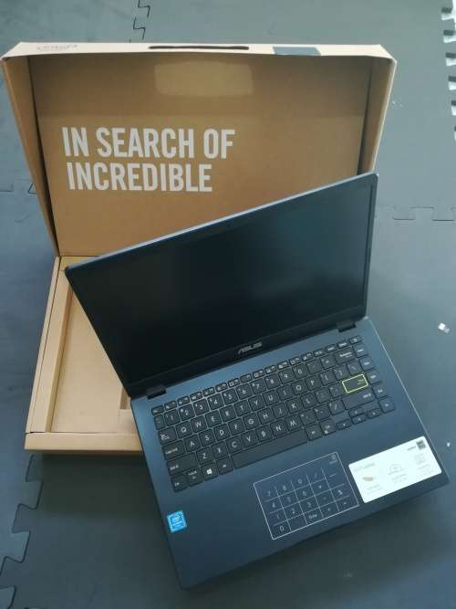 ASUS E410 4GB ram 128GB memory