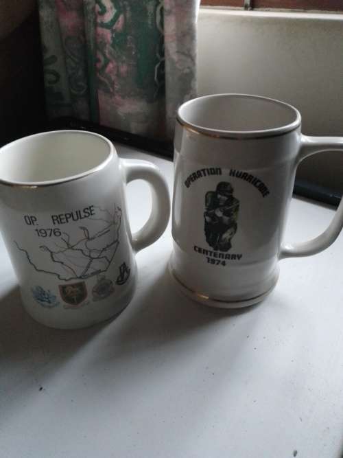 Two Rhodesian bush war souvenir, collectors item bush mugs