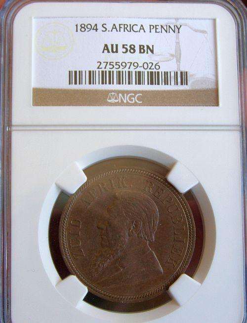 1894 Paul Kruger penny graded AU58 by NGC. The penny with the least minted.