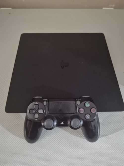 Playstation 4 Slim 1TB plus 3 Games