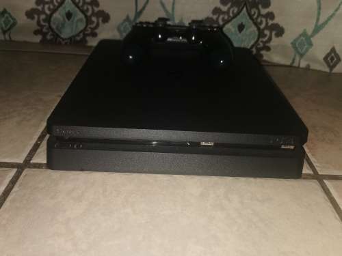 Playstation 4 Slim Line 1 Terabyte and Games