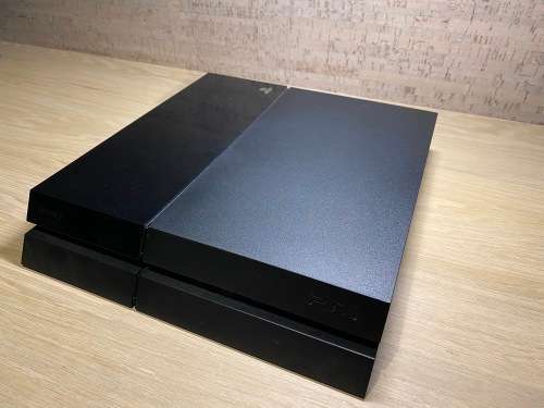 Playstation 4 , 2 Controllers , 4 Games and Charging dock Bundle