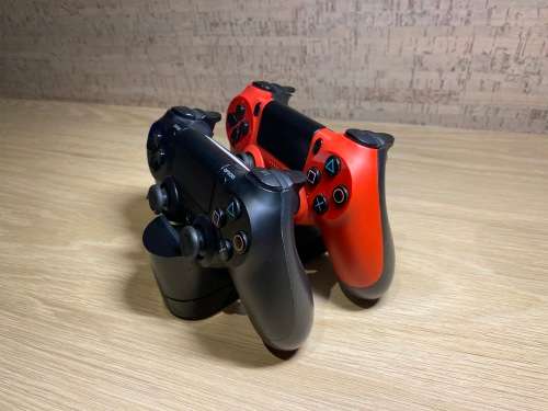 Playstation 4 , 2 Controllers , 4 Games and Charging dock Bundle