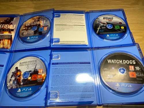 Playstation 4 , 2 Controllers , 4 Games and Charging dock Bundle