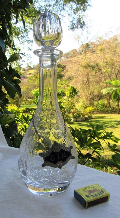A LARGE CRYSTAL DECANTER WITH FACETED BALL STOPPER AND WINE LABEL~DAMAGE FREE!!!!