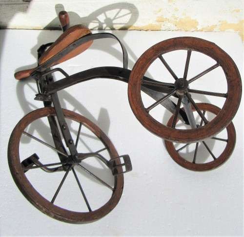 STURDY WOOD AND METAL OLD LOOKING TRICYCLE WHEELS TURN DISPLAY ITEM