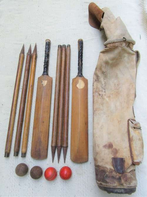 VERY OLD CRICKET SET 2 BATS, SET OF WICKETS, OLD BALLS AND ORIGINAL BAG USED BUT INTACT