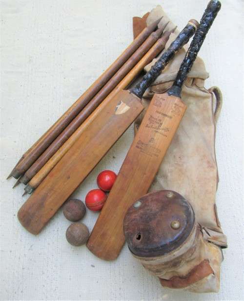 VERY OLD CRICKET SET 2 BATS, SET OF WICKETS, OLD BALLS AND ORIGINAL BAG USED BUT INTACT