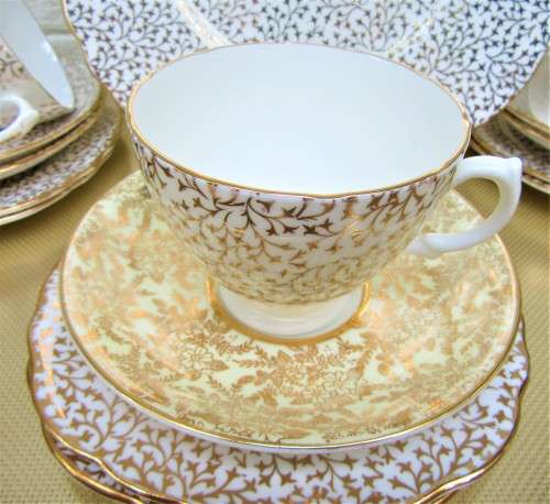 VERY NICE 21 PIECE GILT PATTERN PORCELAIN TEA SET BY CROWN REGENT