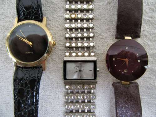 AMAZING COLLECTION QUALITY WOMANS WRIST WATCHES, ONE HAS A REAL DIAMOND WOW!!!