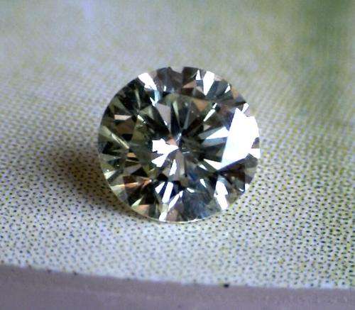 Beautiful engagement quality diamond 0.30 carats - VS2 - O (lightly tinted yellow)
