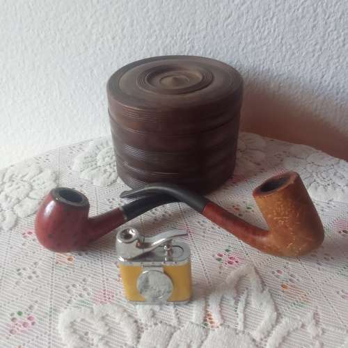Vintage smoking pipes with tobacco holder and lighter