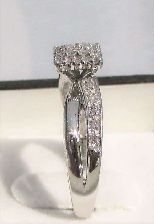 Ultra Sparkly White Gold Diamond ring valued at ( R28 528 ), with valuation certificate.