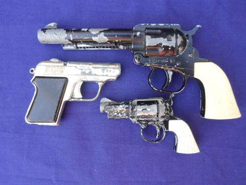3 old cap guns
