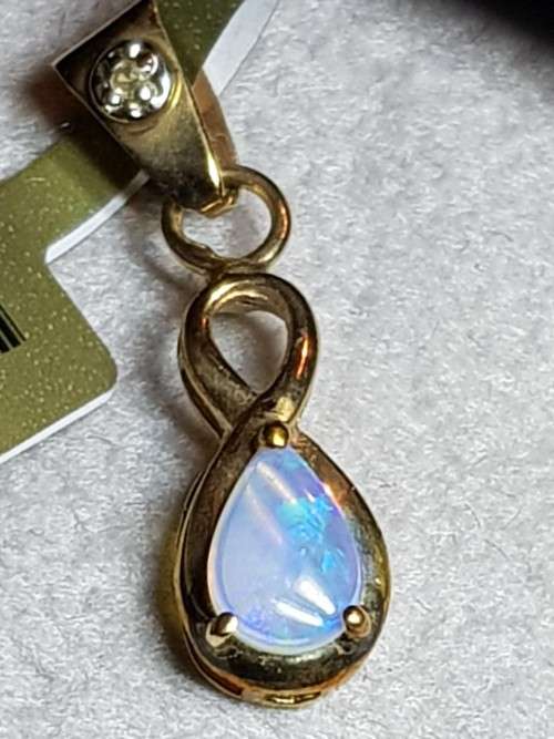 0.3 Carat Opal and Diamond Pendant