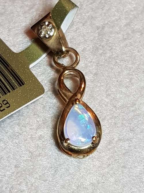 0.3 Carat Opal and Diamond Pendant
