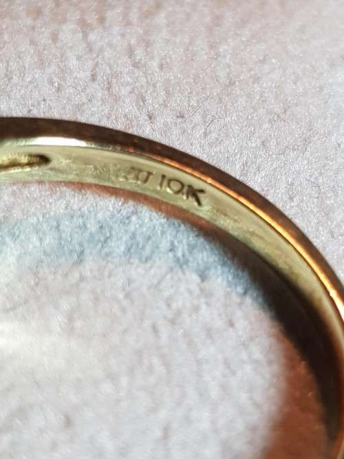 10kt Gold Aquamarine ring with 3 diamonds flanking each side