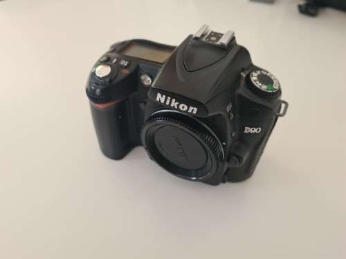 Nikon D90 with 18-105mm lens and 70-300mm lens and accessories