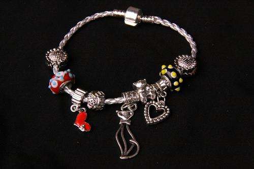 BEAUTIFULL 925 STERLING SILVER AND \SILVER LEATHER PANDORA BRACELET