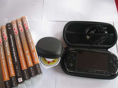 PSP SLIM AND LITE LIMITED EDITION bundle with 7 top games******LIKE NEW