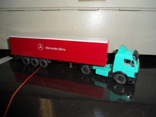 A Herpa M/Benz truck and trailer