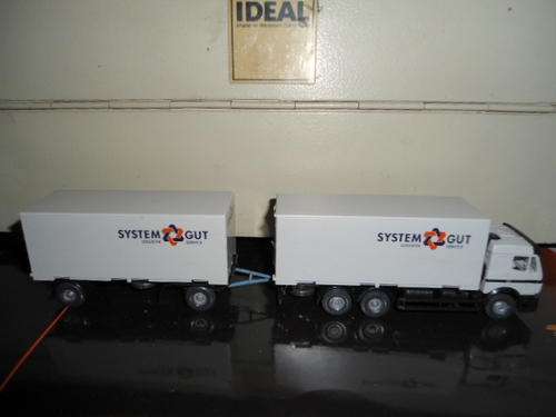 A Herpa HO Mercedes Benz rgid truck with trailer