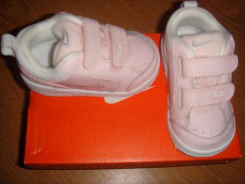 Pink nike girls shoes (size 4.5)