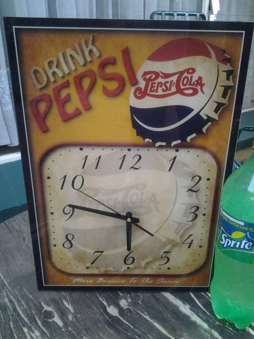 pepsi cola advertising clock