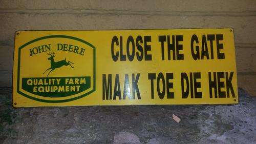 Enamel John Deere Sign.