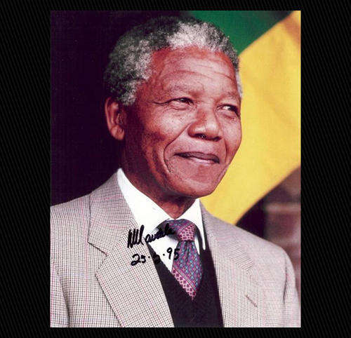Nelson Mandela signed and dated photo.