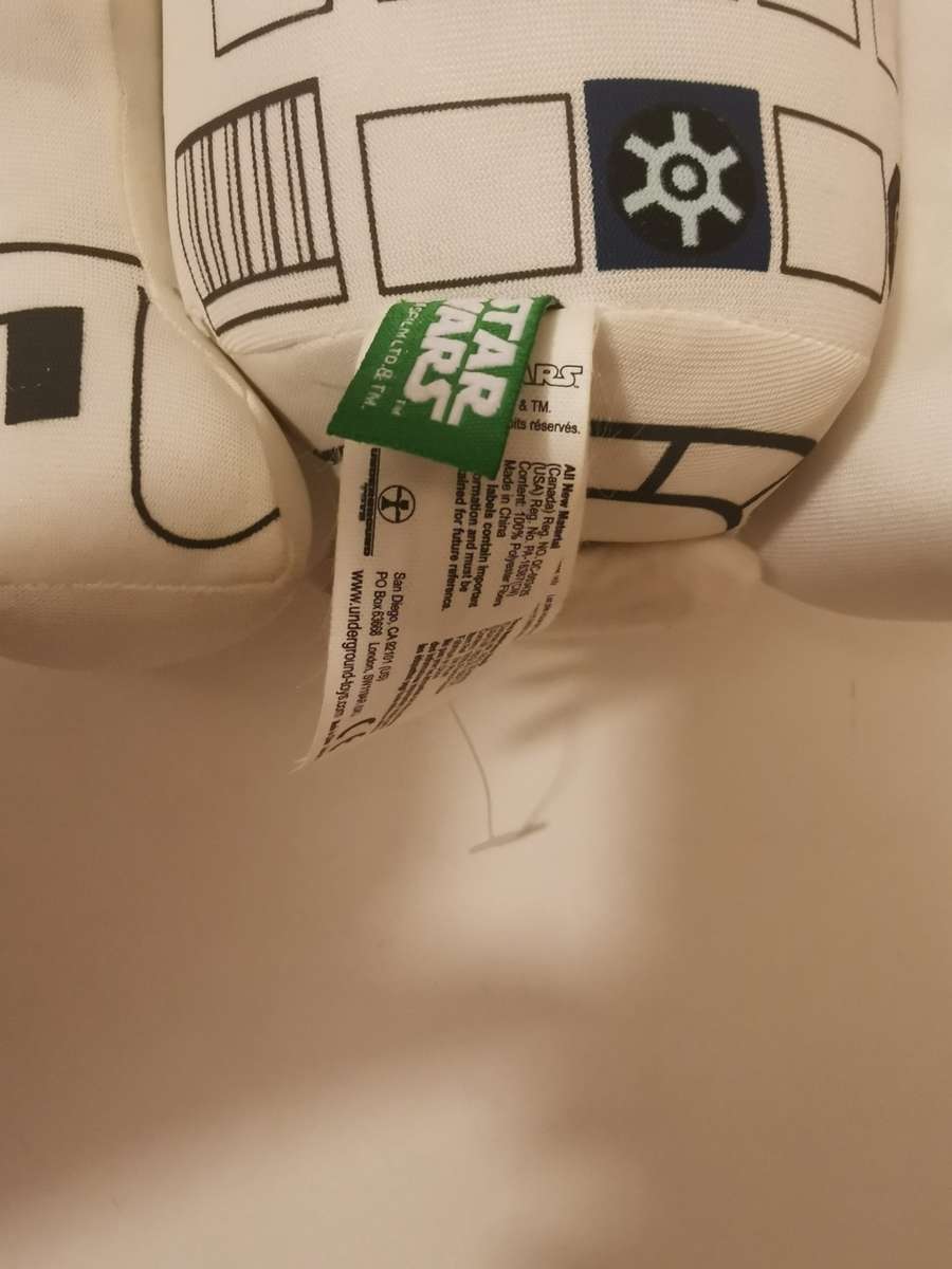 Plush toys R2D2 and Pikachu