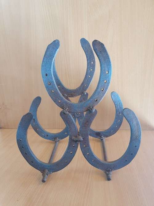 Metal Horse Shoe Wood Stacking Rack