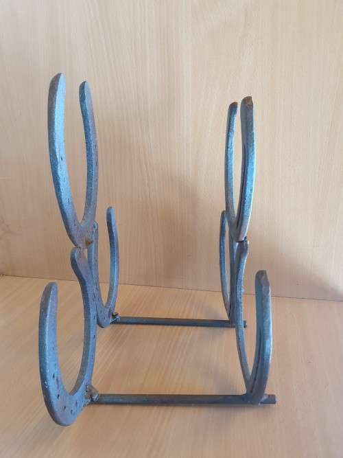 Metal Horse Shoe Wood Stacking Rack