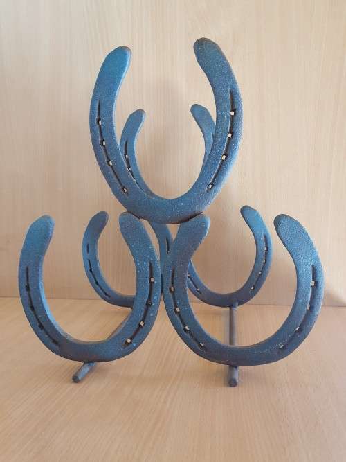 Metal Horse Shoe Wood Stacking Rack
